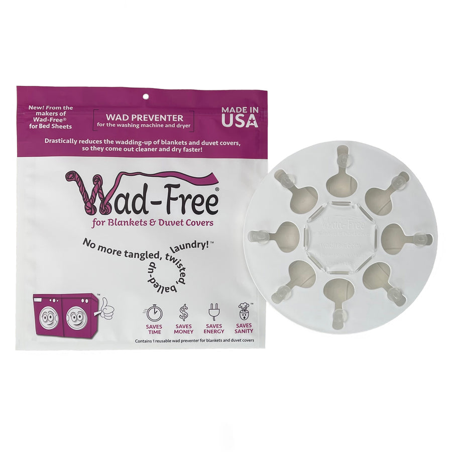 Wad-Free for Blankets and Duvet Cover Packaging and Product Photo Made in USA The package is bright orchid and white showing the logo in orchid and a washer and dryer cartoon character in orchid. The Wad-Free product is a white round plastic disc with eight keyholes and 8 clear tabs