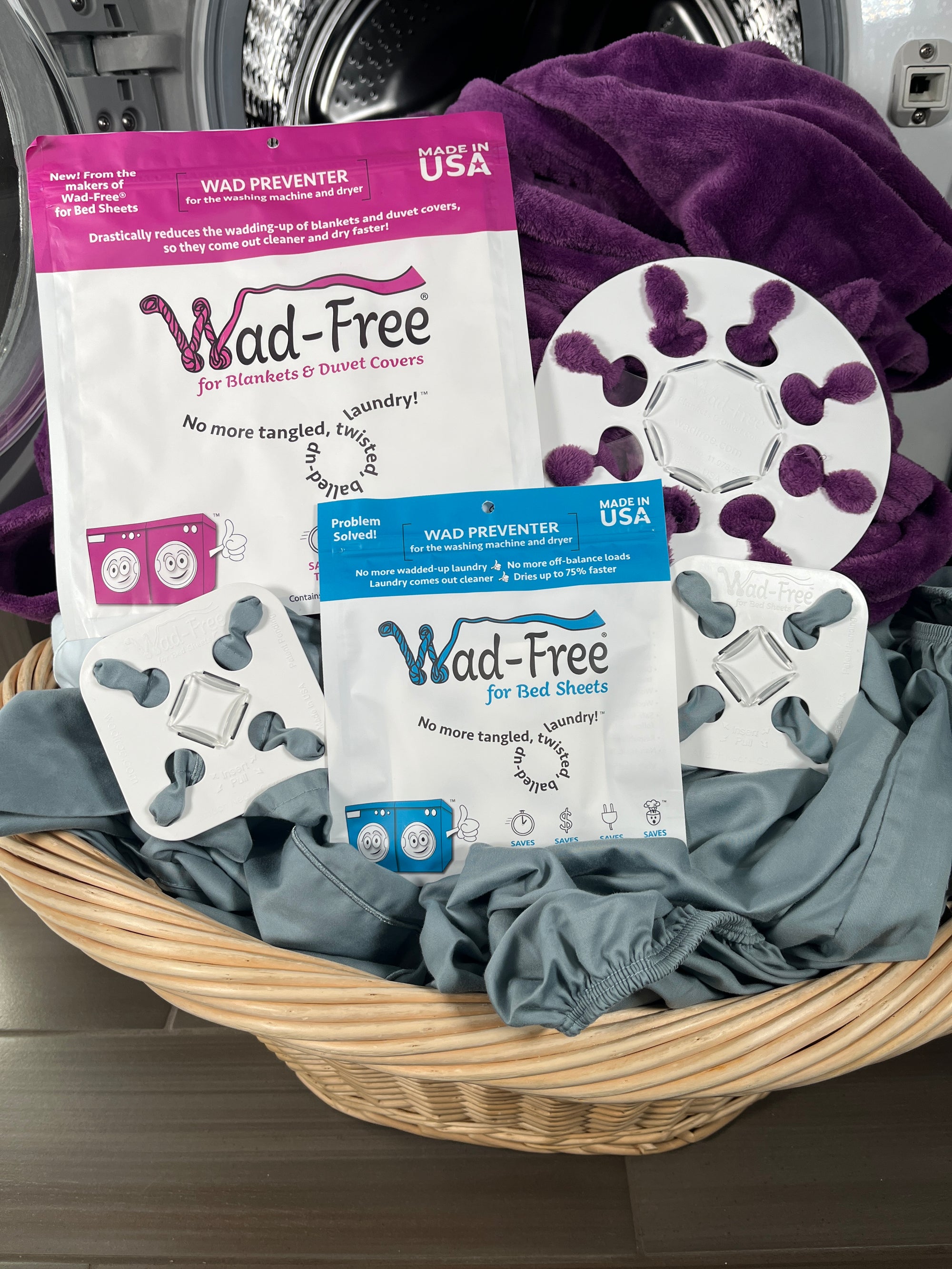 Wad-Free for Bed Sheets attached to grey sheets and Wad-Free for Blankets & Duvet Covers attached to purple blanket